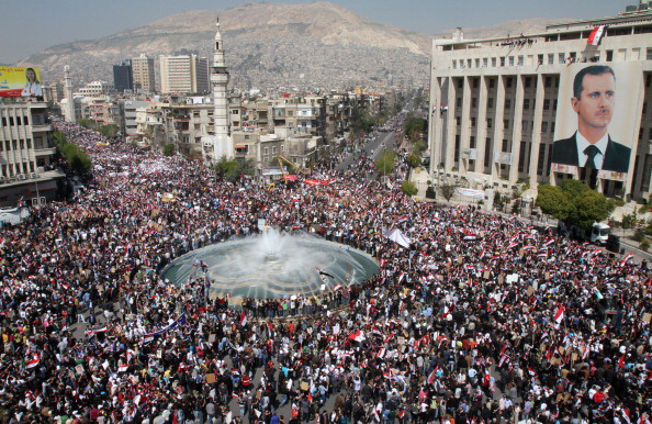 Thousands of Syrians rally to show their